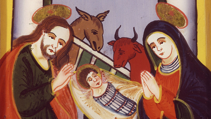 Bunte, koreanische Krippenfiguren: Maria, Josef und das Jesuskind.