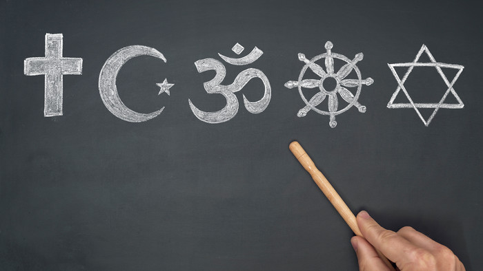 Symbole der fünf Weltreligionen an der Tafel