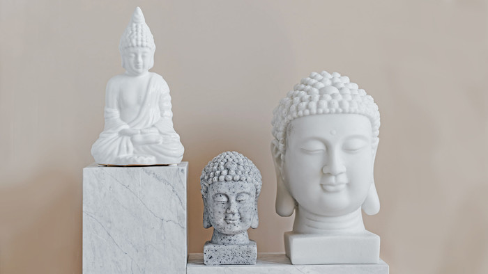 Drei Buddhaköpfe